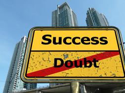 "Success, no doubt " road sign near the buildings, under the blue sky, clipart