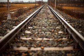 straight railway with stones