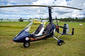 personal helicopter on a green meadow