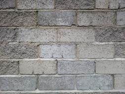 Close-up of the colorful stone wall texture with bricks