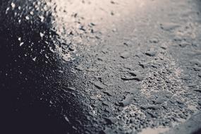 drops of water and wet asphalt