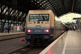 train near the platform at the railway station