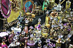 lot of Colorful Perfume Bottles and mirrors