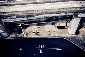 road near concrete building in japan