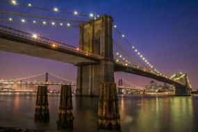 glowing bridge at night