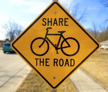 yellow road sign, bike path