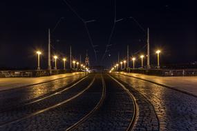 night, tram tracks and street lights