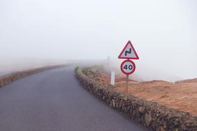 speed limit on a foggy road