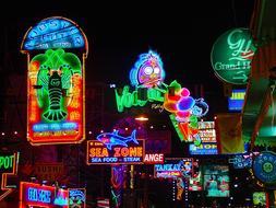 Neon Lights Signs at dark street