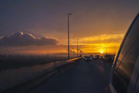 highway traffic at sunset