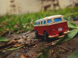 travel van as miniature model in blurred background