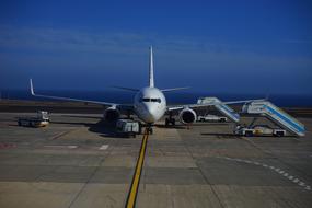 Aircraft in the airport of Tenerife, under the blue sky