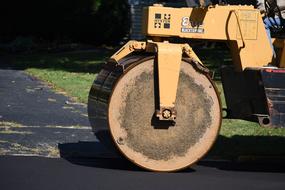 roller while paving