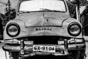 black and white photo of a vintage car