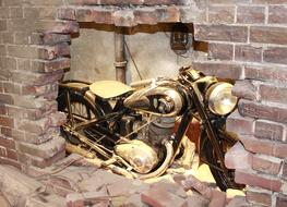 Old Motorcycle and broken wall