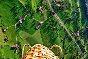 view of the green fields from the height of the balloon flight