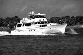 monochrome photo of Luxury Yacht Boat Cruising