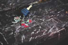 keys with keychain with strawberries