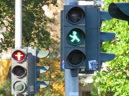 red and green men as traffic signals