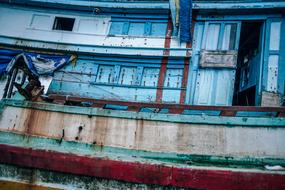 old rusty Boat with Wooden accomodation