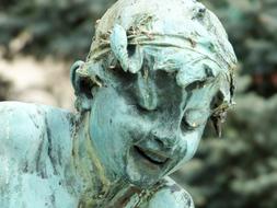 Bronze child Statue on Street