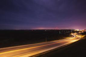 night highway with car headlights