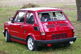 Small red car, Fiat 126p rear view