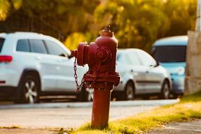 parked cars and red fire hydrant