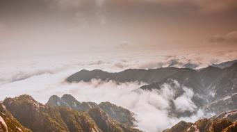 Beautiful landscape of the Huangshan in clouds, under the colorful sky