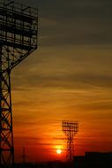 satellite towers against the background of the evening orange sky, Saratov, Russia