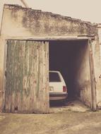Car in Door Garage