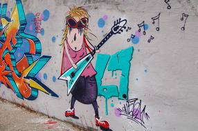 graffiti, comic musician with rock guitar