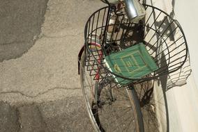 green book in bike basket