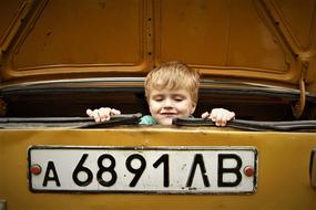 Kid in Retro Car