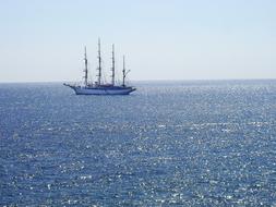 sailing ship in the ocean, sun