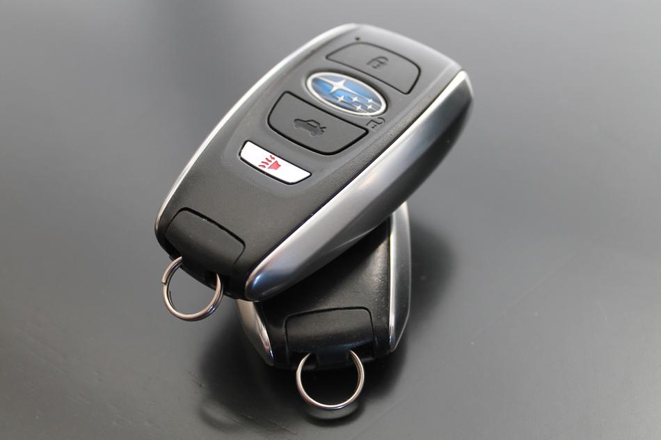 Close-up of the two Subaru car keys with key rings