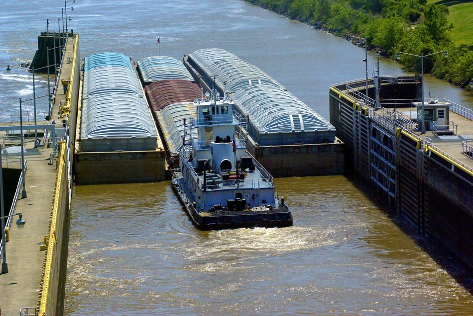 Towing A Barge Coming Out Of The Gateway Murray