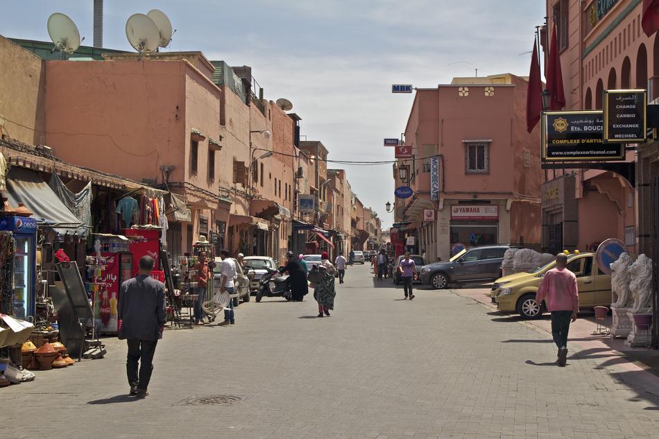 People, on the beautiful street of Marrakech in Morocco, North Africa, in in sunlight