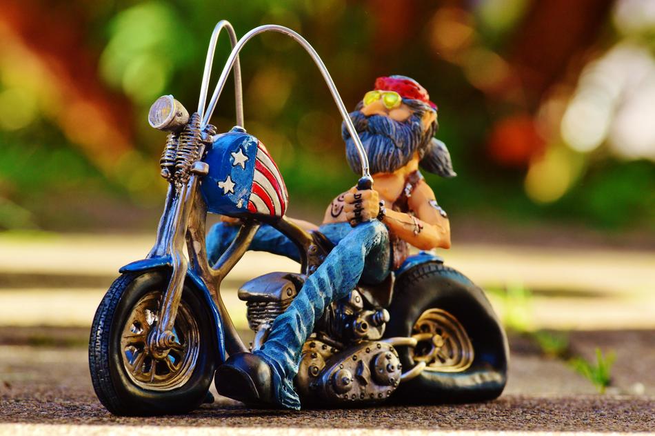 Tattooed Biker, funny figurine at blur background