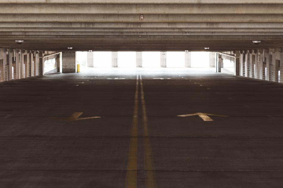 Parking deck on the street, with the signs