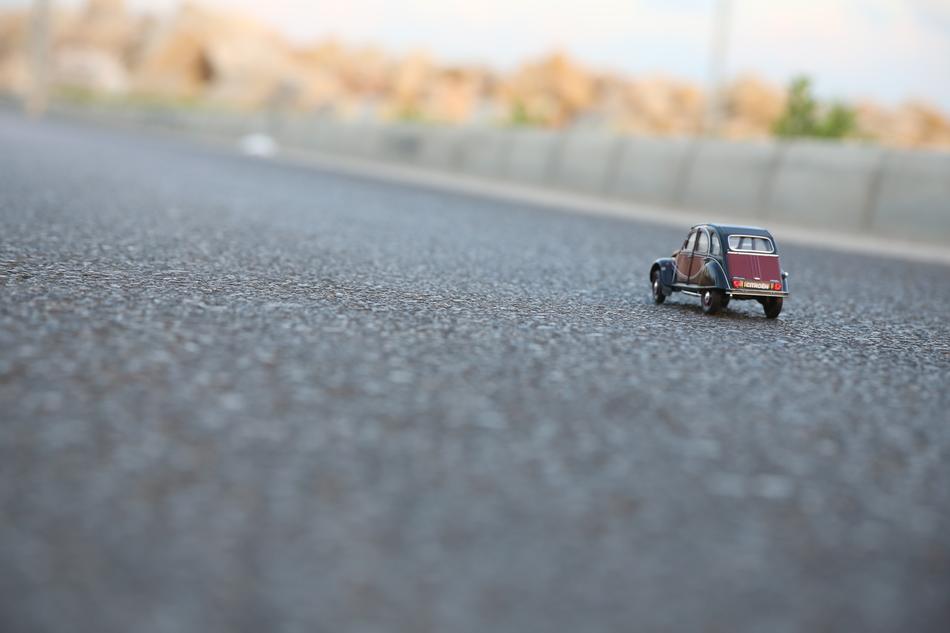 mini car on the asphalt in a blurred background