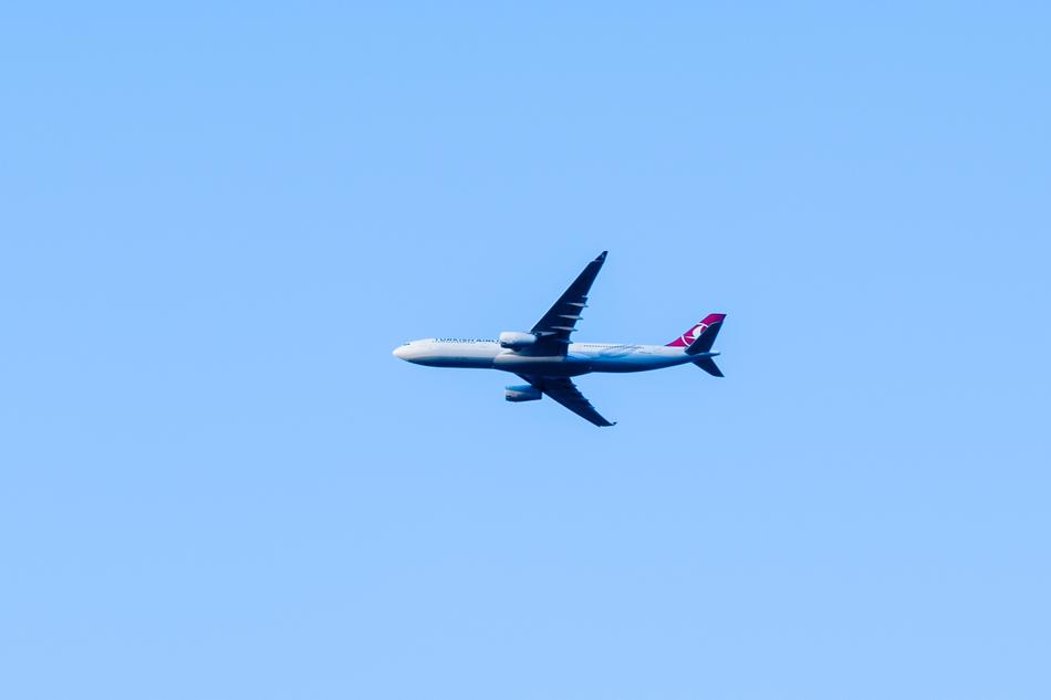 Turkish Airlines Plane in the blue clear sky