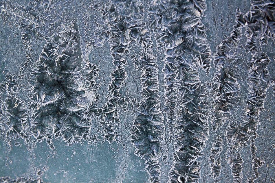 Ice Flowers on glass close-up