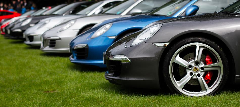 row of new Luxury Cars on lawn