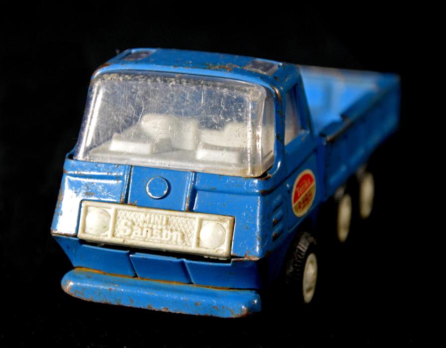 Tonka Rico as a mini model on a black background