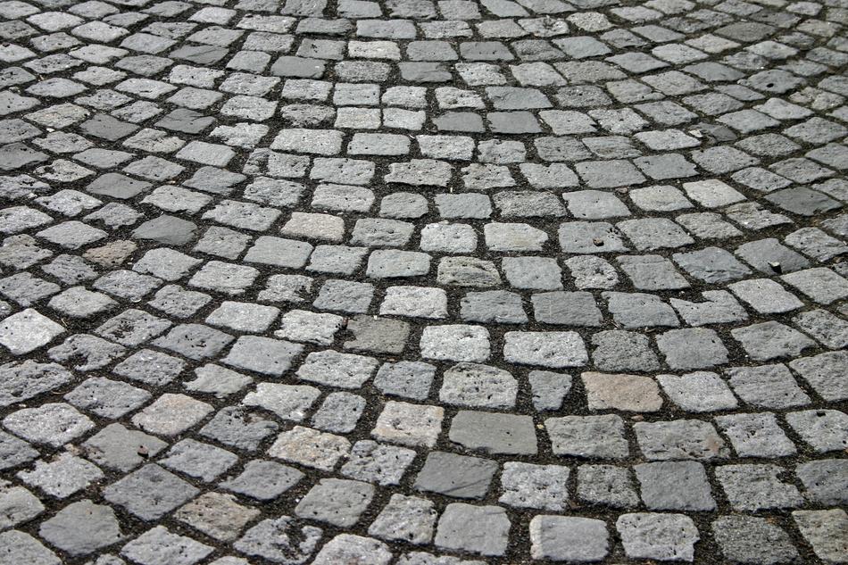 paved square, gray boulders