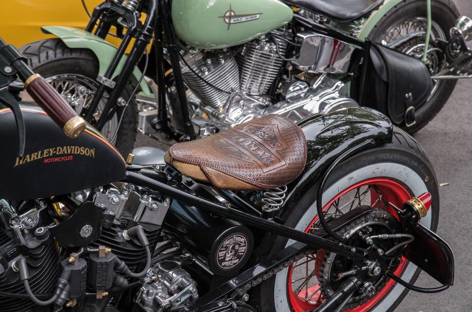 Colorful 'Harley Davidson' motorcycles with the saddles
