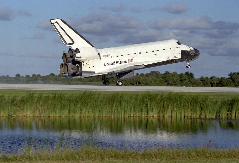 space shuttle taking off on the runway