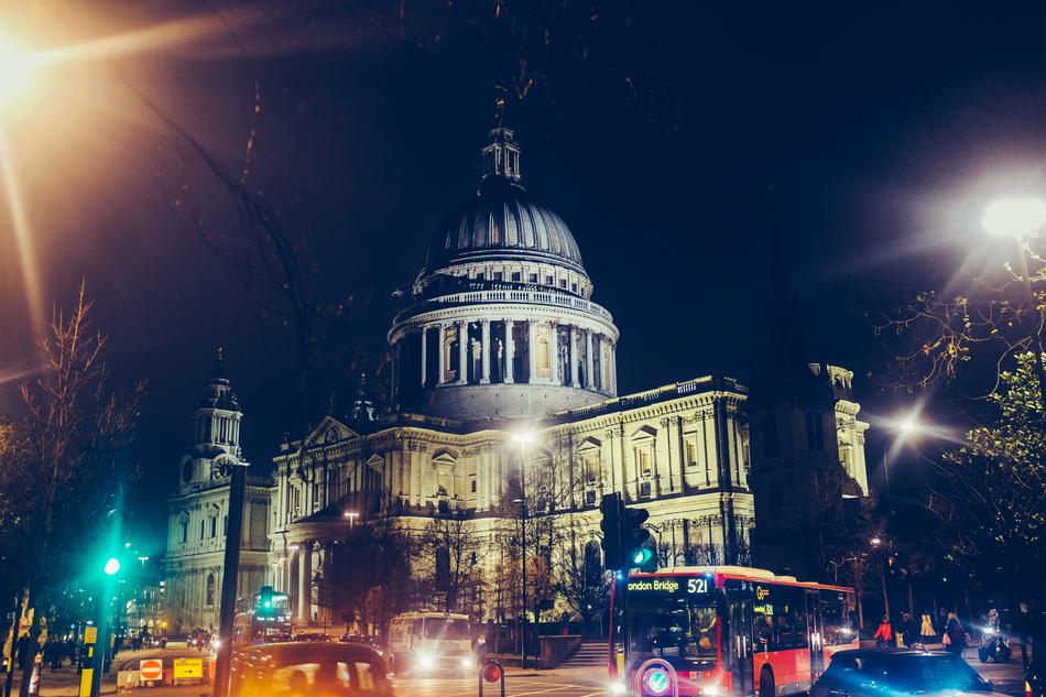 cars, cathedral and street lights in London, England