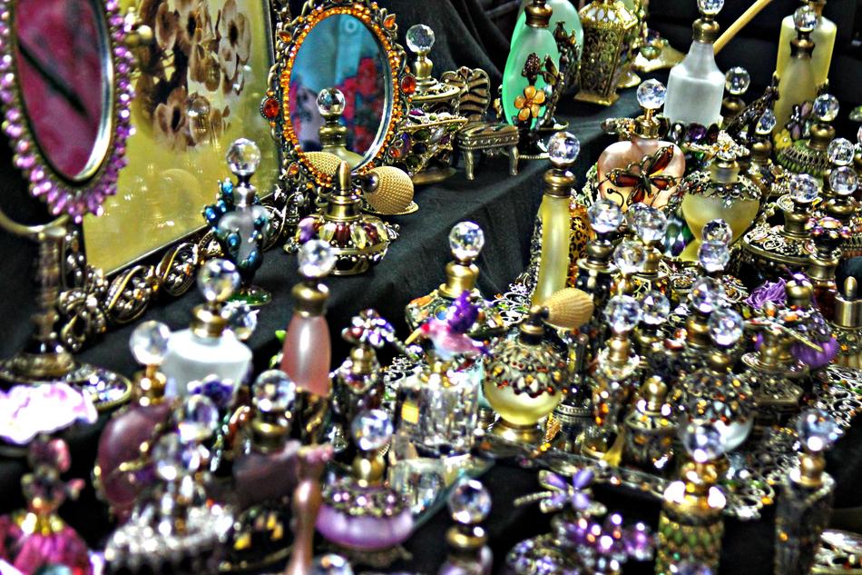 lot of Colorful Perfume Bottles and mirrors